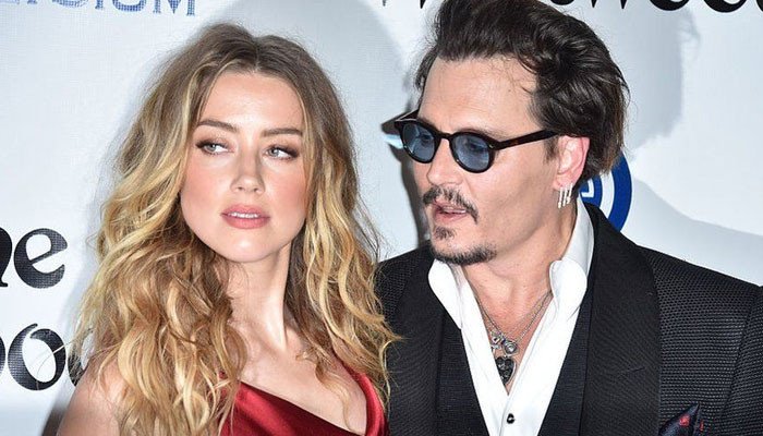 Amber Heard says in court she â€˜lovedâ€™ Johnny Depp â€˜very muchâ€™ after he tried to kill her